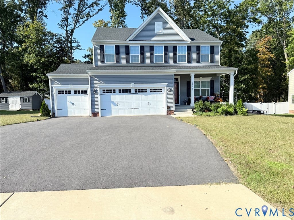 14225 Botsford Avenue, Wellspring, Chester, VA 23831 Two-story residence featuring light gray siding and a prominent gabled roofline