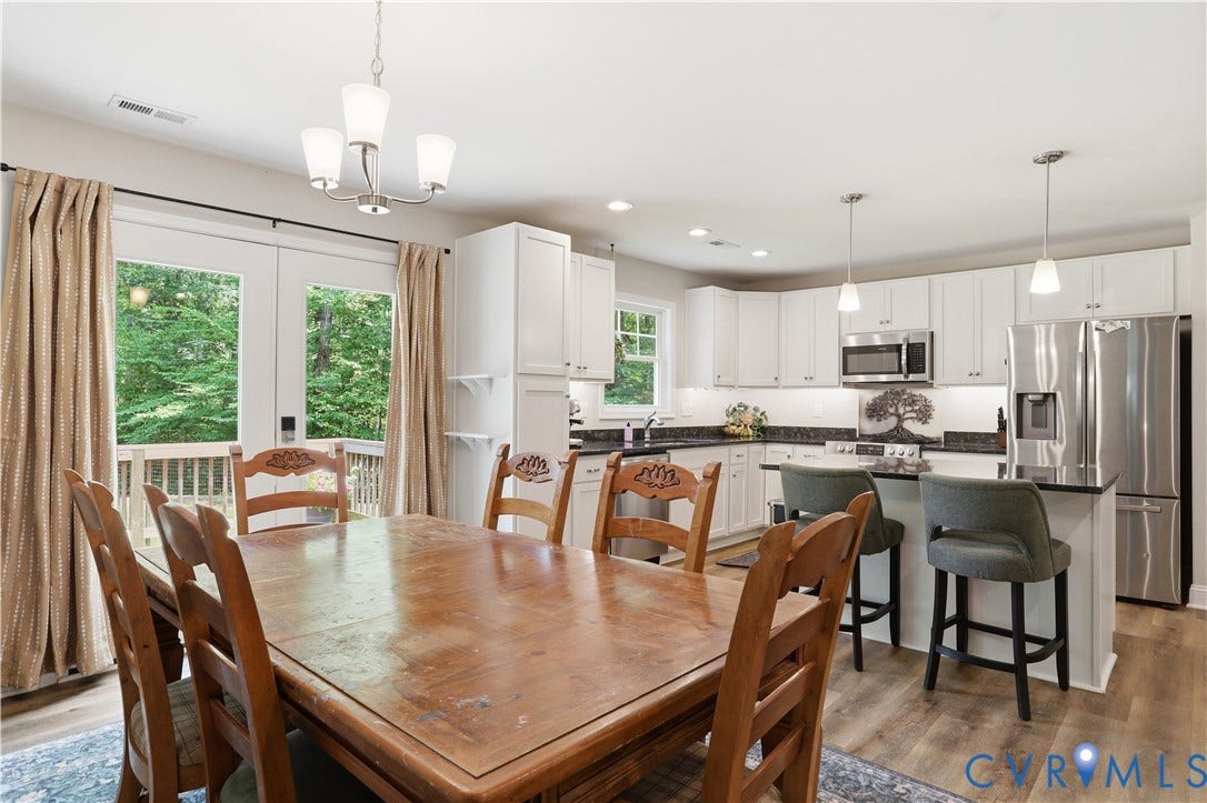 4939 Shannon Hill Road, Kents Store, VA 23084 Dining area is open to the kitchen with french doors to the back deck.