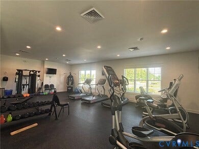 7580 Southamptonshire Way, Autumn Pines, New Kent, VA 23124 Dedicated fitness area featuring durable rubber flooring, recessed lighting, and multiple windows