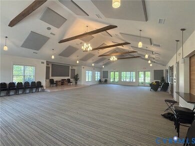 7580 Southamptonshire Way, Autumn Pines, New Kent, VA 23124 Vaulted ceilings with exposed wood beams, recessed lighting, chandeliers, and acoustic paneling