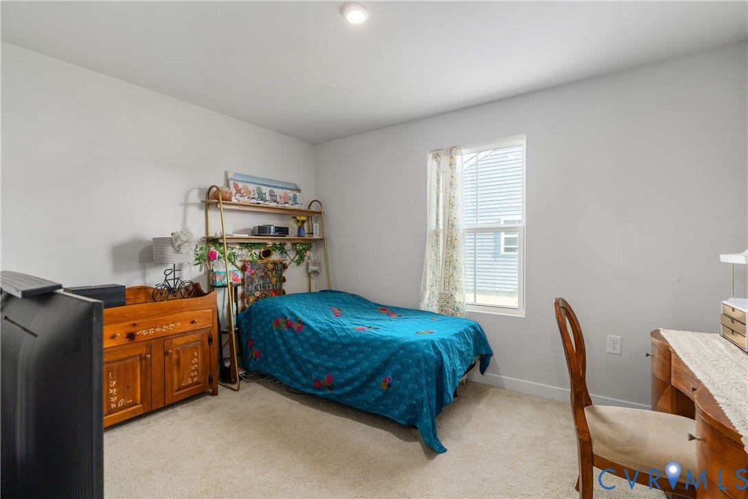 7580 Southamptonshire Way, Autumn Pines, New Kent, VA 23124 Neutral wall finishes, carpeted flooring, and a single window with white trim