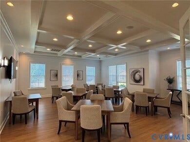 7580 Southamptonshire Way, Autumn Pines, New Kent, VA 23124 Coffered ceiling with recessed lighting, wood-finish flooring, multiple windows with blinds, and white trim throughout