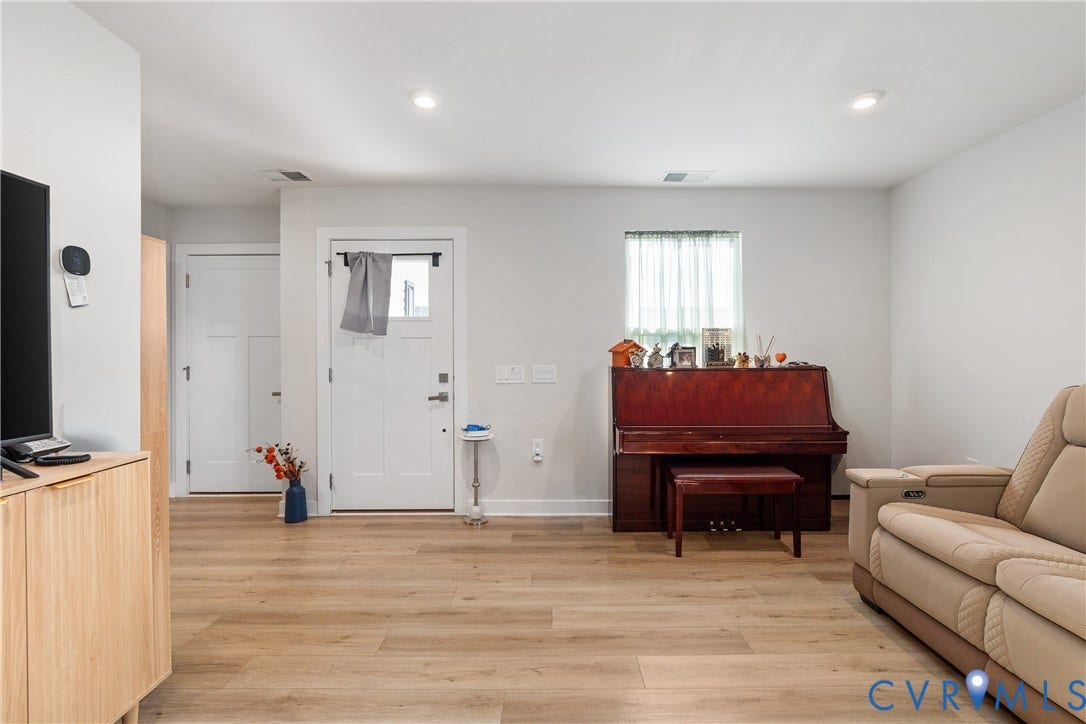 7580 Southamptonshire Way, Autumn Pines, New Kent, VA 23124 Wood-finish flooring throughout, recessed lighting, and a window with natural light