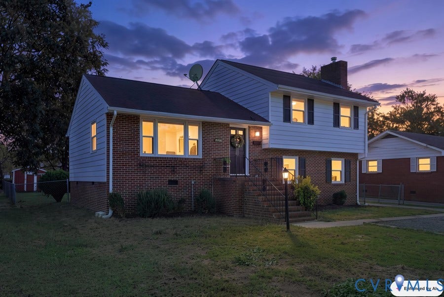 20306 Sheffield Place, Laurel Branch Farms, South Chesterfield, VA 23803 Brick and siding exterior featuring a multi-level design, front entry with steps, and a permanent exterior light fixture