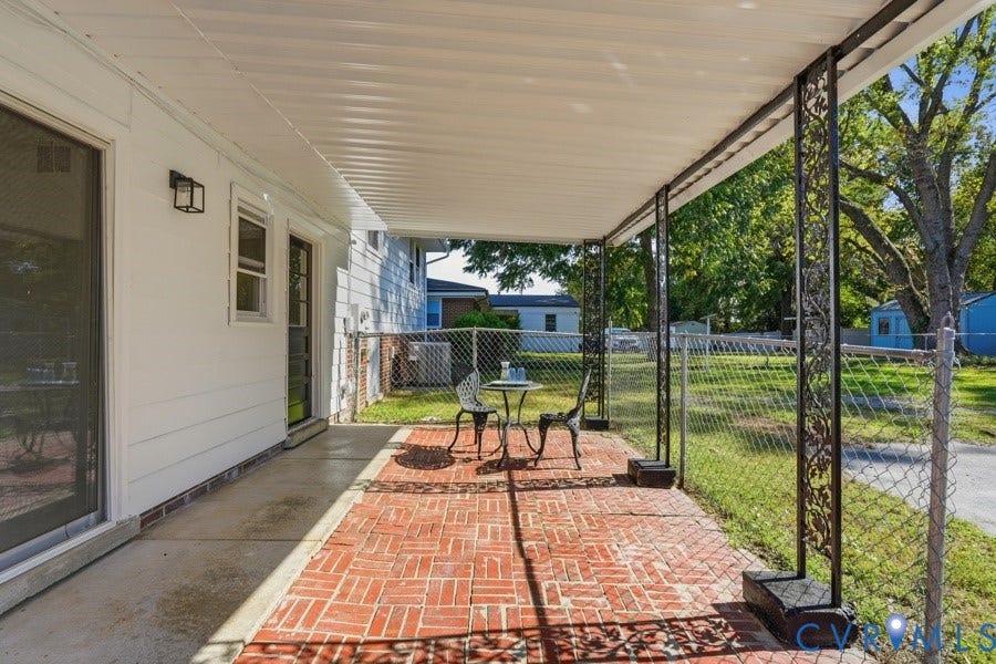 20306 Sheffield Place, Laurel Branch Farms, South Chesterfield, VA 23803 Covered patio with a brick paver floor, white siding, and decorative metal support columns