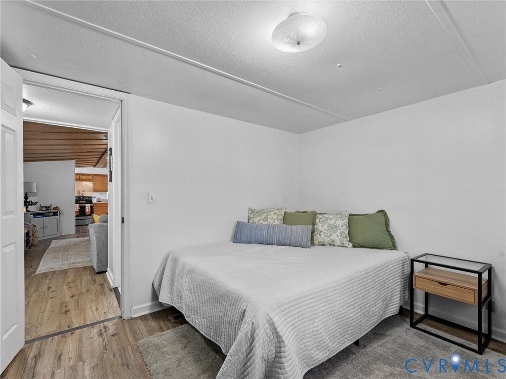 17009 Lansmill Drive, South Chesterfield, VA 23834 Recessed ceiling light fixture, wood-finish flooring, white walls, and white trim