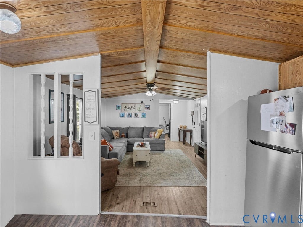 17009 Lansmill Drive, South Chesterfield, VA 23834 Vaulted wood-paneled ceiling with exposed beams, wood-finish flooring, and recessed lighting