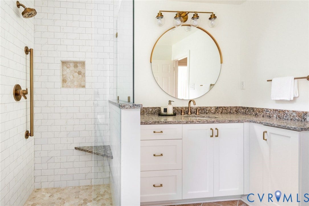 207 Tarrytown Drive, Sleepy Hollow, Henrico, VA 23229 Beautifully updated hall bathroom servicing two nearby bedrooms with custom vanity, stone counters and seamless glass shower.