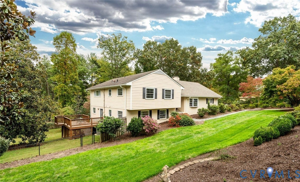 207 Tarrytown Drive, Sleepy Hollow, Henrico, VA 23229 Custom brick quad-level in the charming Sleepy Hollow neighborhood.