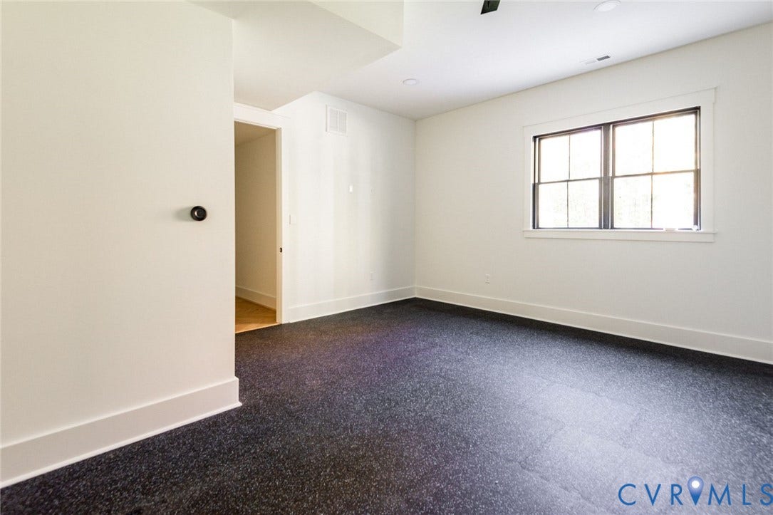 1136 Getaway Lane, Tuckahoe Creek, Goochland, VA 23103 Lower level workout room with exercise floor and nearby full bathroom.