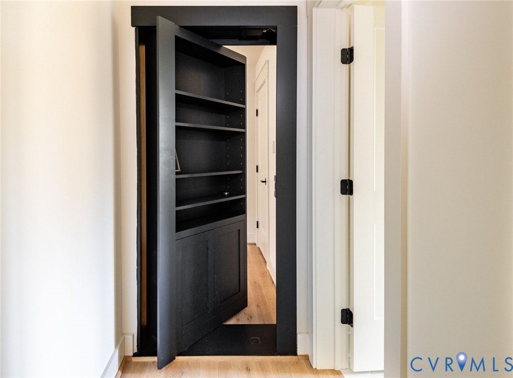 1136 Getaway Lane, Tuckahoe Creek, Goochland, VA 23103 Custom bookcase Murphy door leading to versatile bonus space.