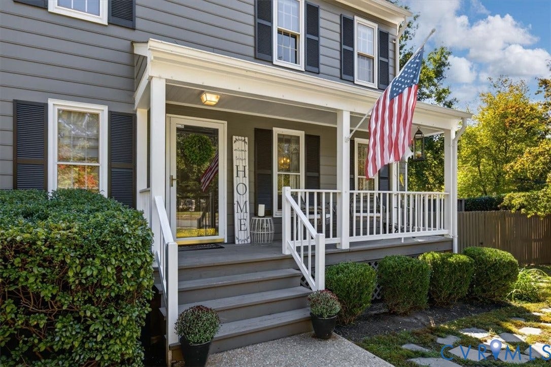 863 Watch Hill Road, Midlothian, VA 23114 Gray siding exterior featuring white trim and dark shutters, with a covered porch