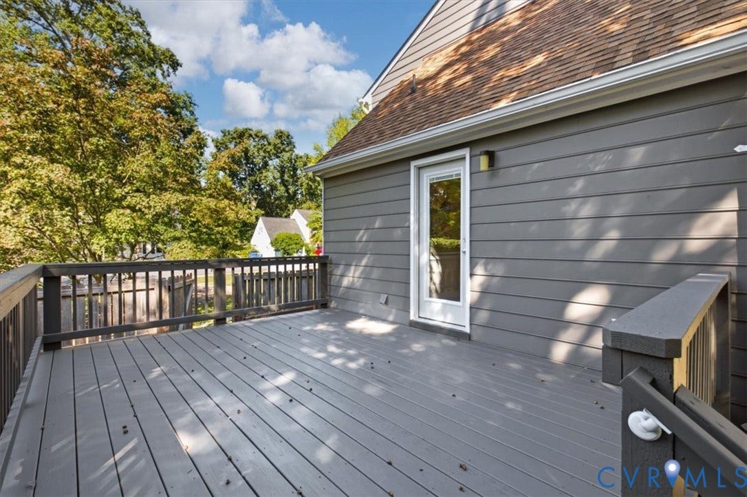 863 Watch Hill Road, Midlothian, VA 23114 Expansive composite deck with clean lines and sturdy railings, anchoring a bright outdoor living space