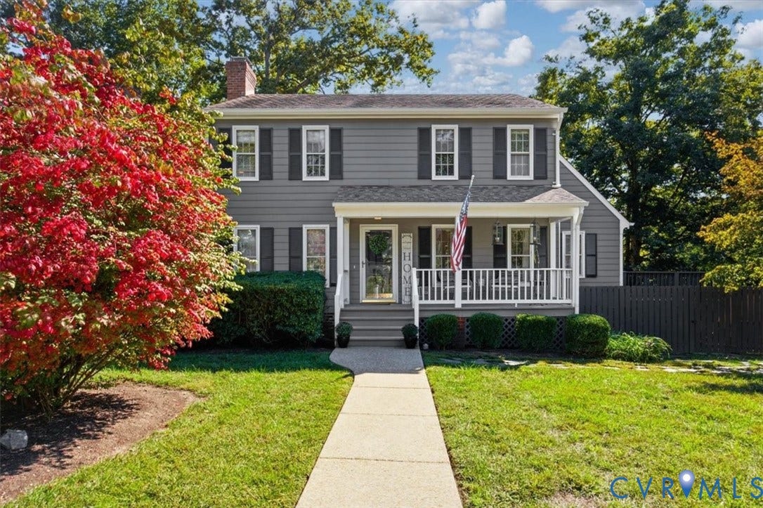 863 Watch Hill Road, Midlothian, VA 23114 Classic Colonial-style residence featuring gray horizontal siding, white trim, and a brick chimney