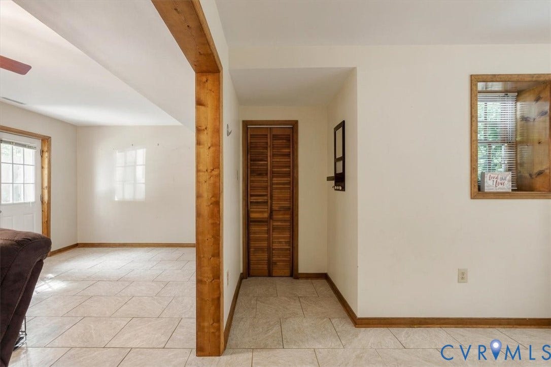 863 Watch Hill Road, Midlothian, VA 23114 Tile flooring, wood-finish trim, wood-finish beam, wood-finish louvered door, and a paneled door