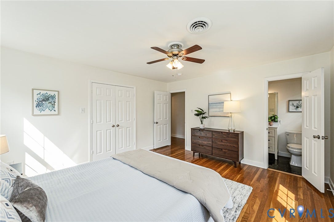 1608 Lochwood Drive, Henrico, VA 23238 Hardwood flooring, ceiling fan with integrated lighting, white paneled doors, and an en-suite bathroom with a white vanity