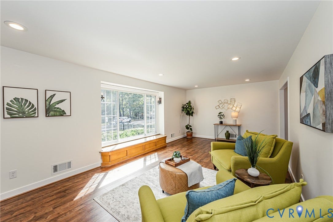 1608 Lochwood Drive, Henrico, VA 23238 Recessed lighting, wood-finish flooring, white walls, and a large bay window with a built-in window seat