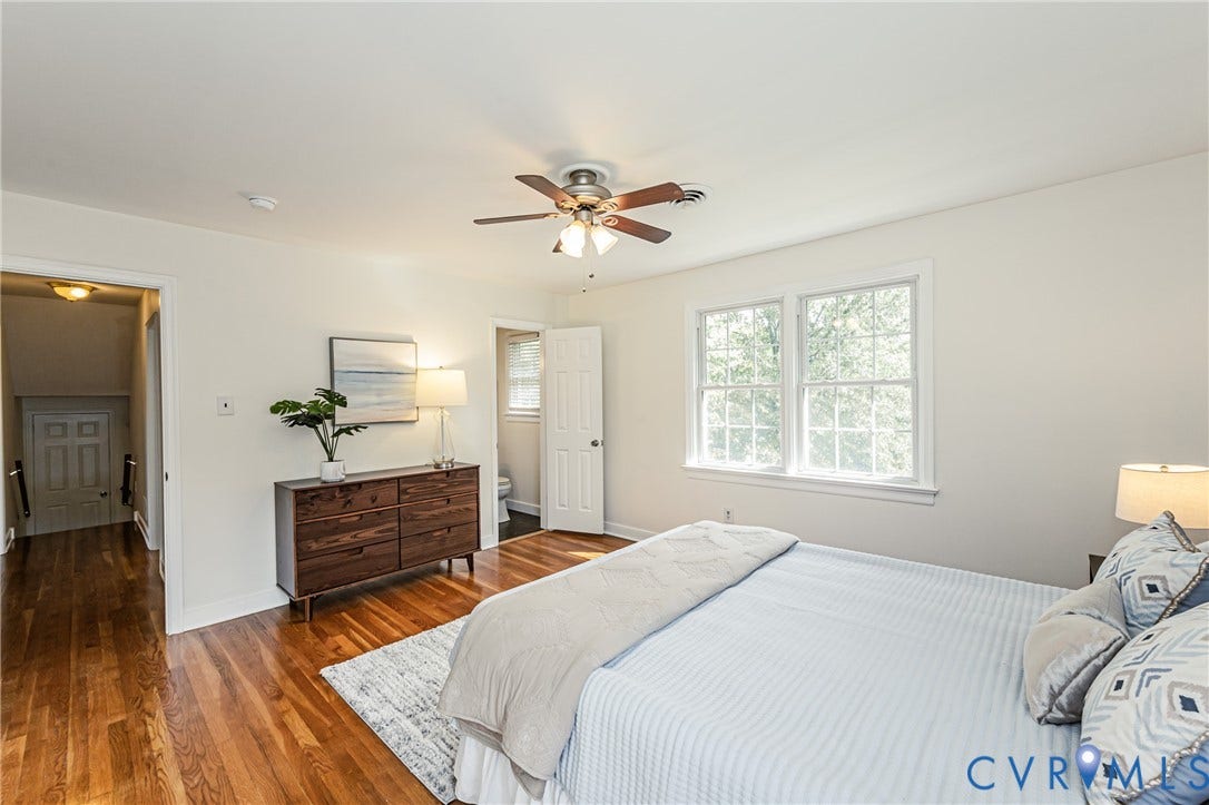 1608 Lochwood Drive, Henrico, VA 23238 Hardwood flooring throughout, a ceiling fan with integrated lighting, and white trim work
