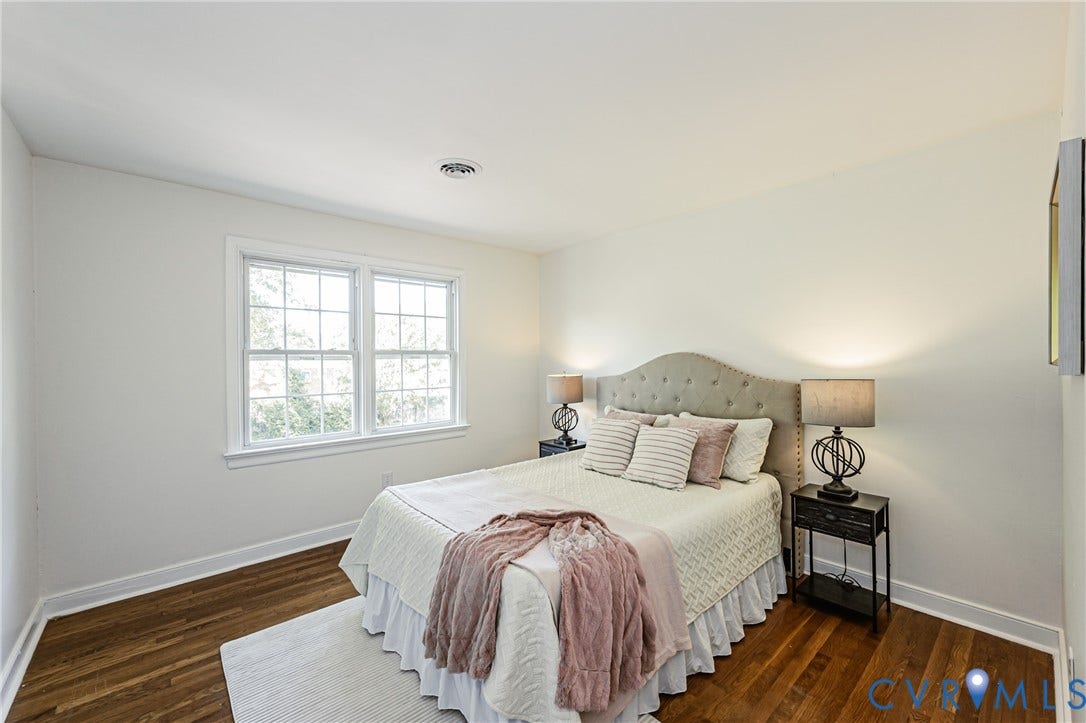 1608 Lochwood Drive, Henrico, VA 23238 Hardwood flooring throughout, bright white walls, and a double window