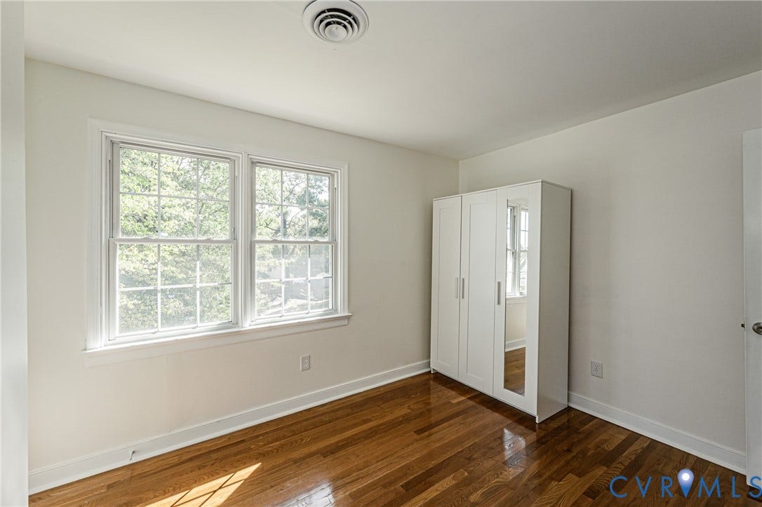 1608 Lochwood Drive, Henrico, VA 23238 Hardwood flooring throughout, bright white walls, and a recessed ceiling vent