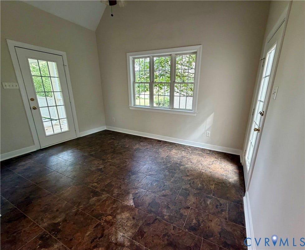 10721 Sheppards Way Drive, Sheppards Way, Glen Allen, VA 23060 Vaulted ceiling, two French doors, large window, tile flooring, and a ceiling fan