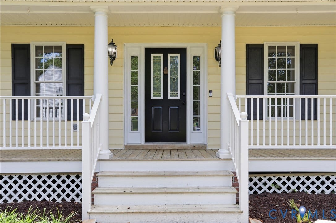 10721 Sheppards Way Drive, Sheppards Way, Glen Allen, VA 23060 Inviting covered front porch with white railing, classic columns, and a dark paneled front door with decorative glass inserts and sidelights