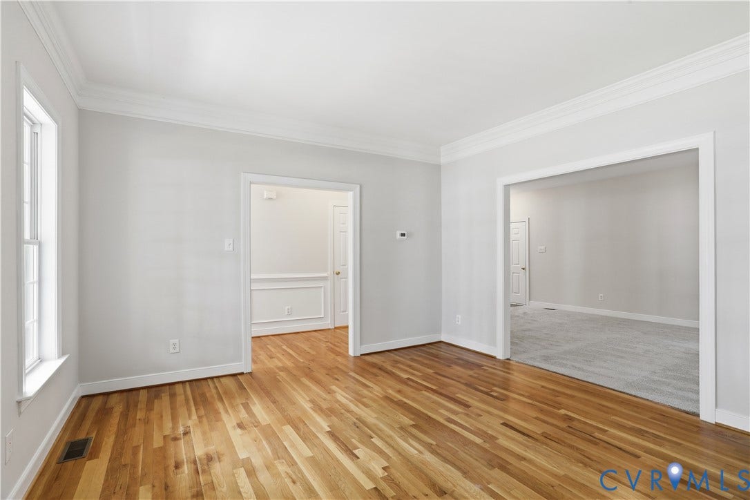 10721 Sheppards Way Drive, Sheppards Way, Glen Allen, VA 23060 Hardwood flooring, crown molding, white trim, light gray wall paint, and natural light