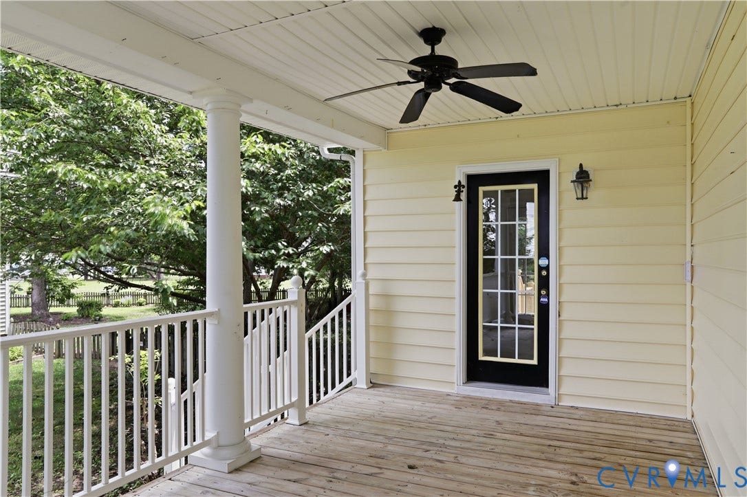 10721 Sheppards Way Drive, Sheppards Way, Glen Allen, VA 23060 Covered porch featuring a wood-finish floor, white railing, and a black ceiling fan