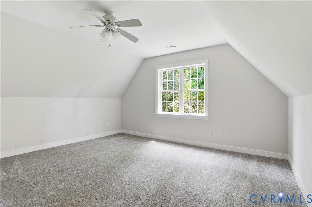 10721 Sheppards Way Drive, Sheppards Way, Glen Allen, VA 23060 Sloping ceiling lines, a ceiling fan, and a double-hung window with a white frame