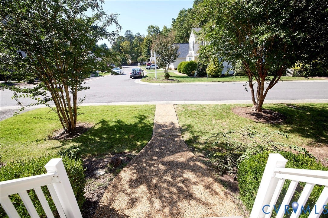 2633 Bradway Lane, Henrico, VA 23233 Welcoming front entry with mature shade trees framing a manicured lawn and concrete walkway