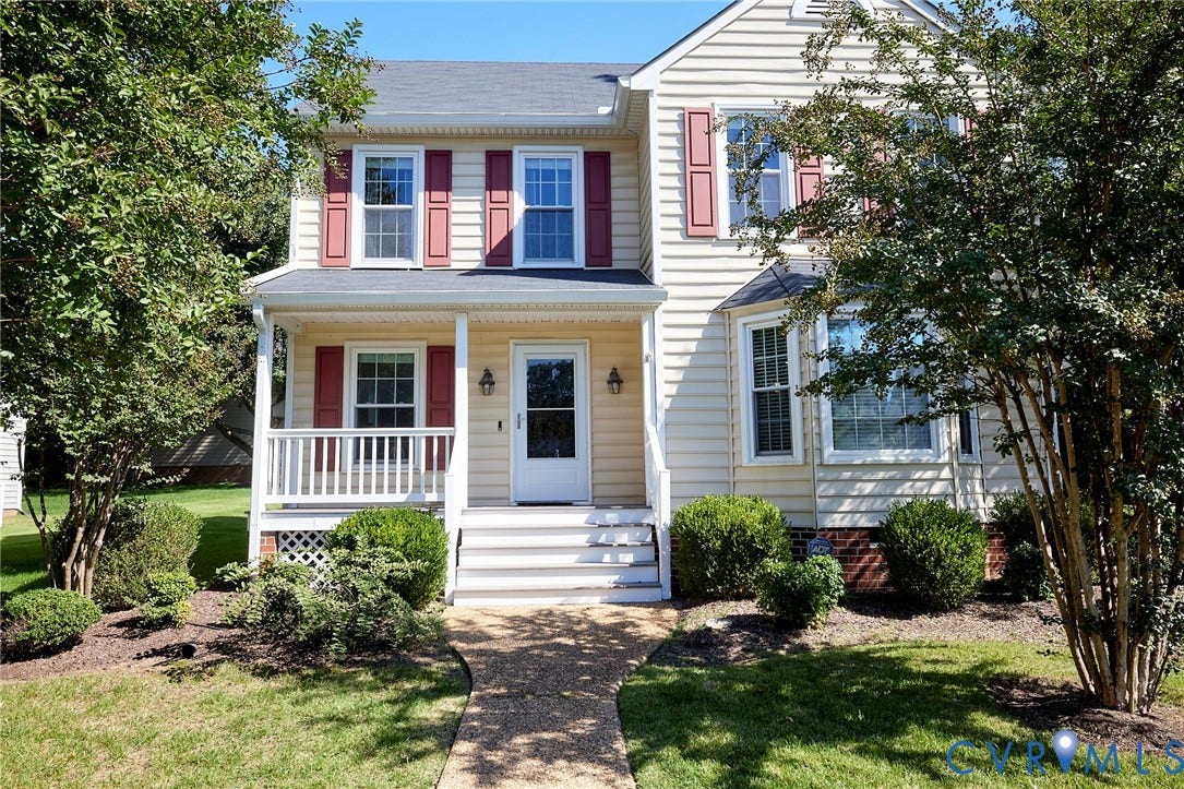 2633 Bradway Lane, Henrico, VA 23233 Two-story residence with light-colored siding and a dark roof
