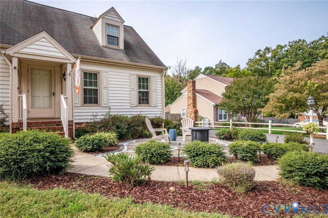 7516 Oakmont Drive, Henrico, VA 23228 Dormer window, covered entry, front-facing exterior shutters, stone-paved patio