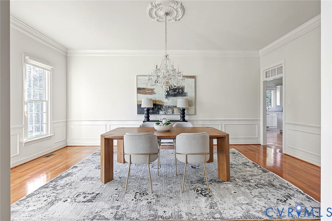 2825 Oak Point Lane, Barrington, Henrico, VA 23233 Sophisticated chandelier, wainscoting and hardwoods create the perfect ambiance.