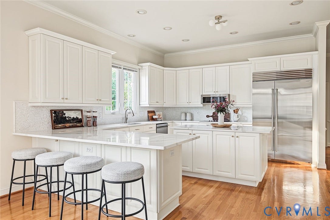 2825 Oak Point Lane, Barrington, Henrico, VA 23233 Top of the line stainless appliances including new Sub Zero fridge and double oven.