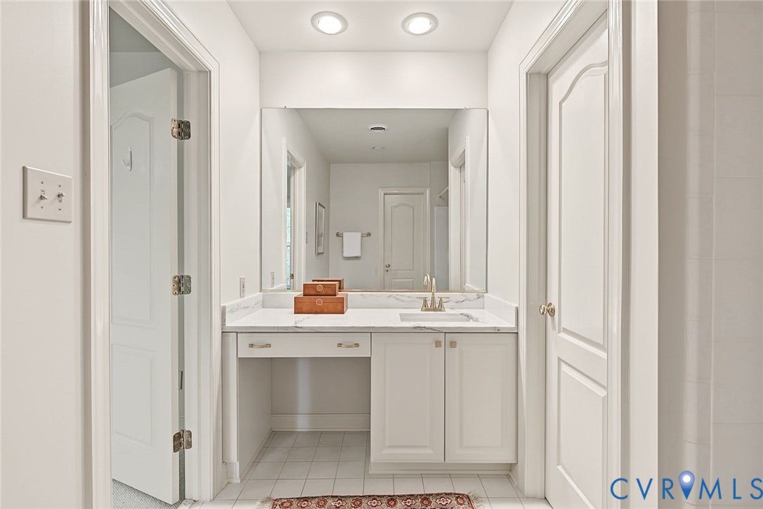 2825 Oak Point Lane, Barrington, Henrico, VA 23233 2nd Floor primary with new quartz counters, brass fixtures and a generous walk in closet.