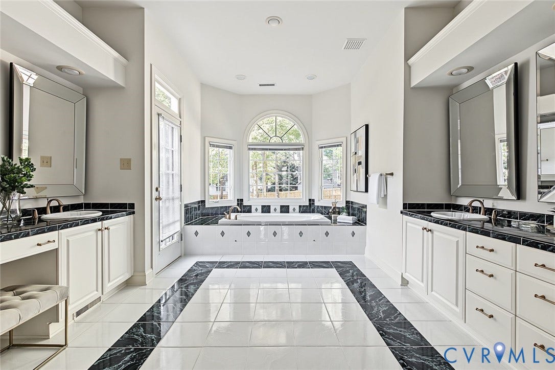 2825 Oak Point Lane, Barrington, Henrico, VA 23233 The primary bath features dual vanities and a jetted tub.