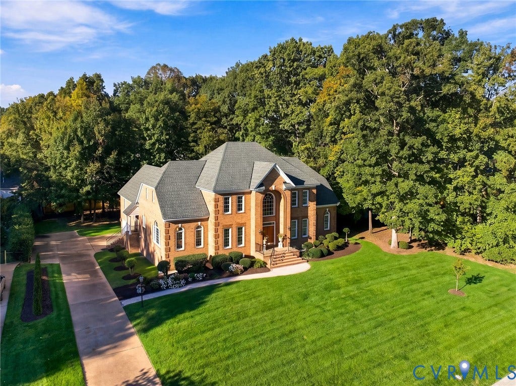 2825 Oak Point Lane, Barrington, Henrico, VA 23233 This stately brick Colonial sits proudly in Barrington's distinguished lake front community.