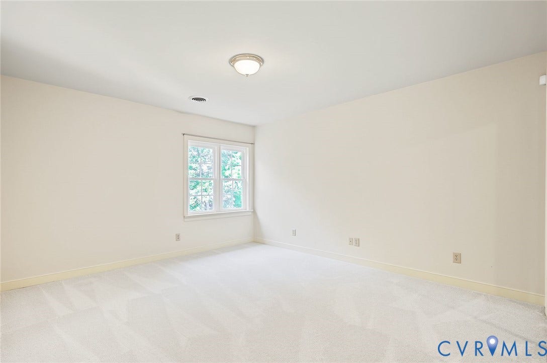 2825 Oak Point Lane, Barrington, Henrico, VA 23233 Bedroom 4 with clean palette and large closet with custom wood shelving.