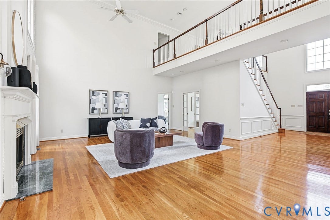 2825 Oak Point Lane, Barrington, Henrico, VA 23233 Hardwood floors, excellent natural light from the new windows and elegant moldings elevate this stunning property.