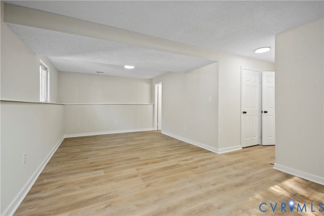 2836 Neale Street, 5-040, Henrico, VA 23223 Wood-finish flooring throughout, white walls, and recessed lighting