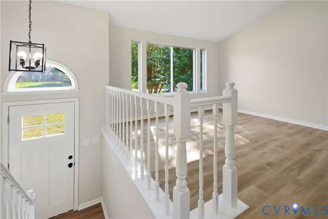 2836 Neale Street, 5-040, Henrico, VA 23223 Entryway featuring a decorative transom window and an overhead geometric light fixture