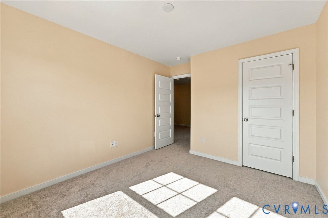10818 Ashton Poole Place, Henrico, VA 23059 Light-colored walls, neutral carpeting, and white trim