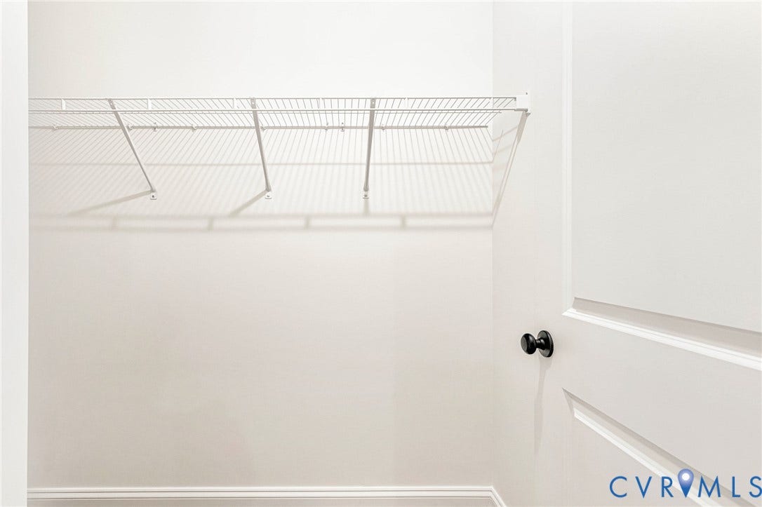 1807 Gordon Avenue, Oak Grove, Oak Grove, VA 23224 Closet with wire shelving system and a white paneled door with a black doorknob