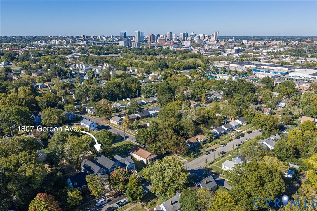 1807 Gordon Avenue, Oak Grove, Oak Grove, VA 23224 Aerial perspective showcasing the residential neighborhood with a distant cityscape