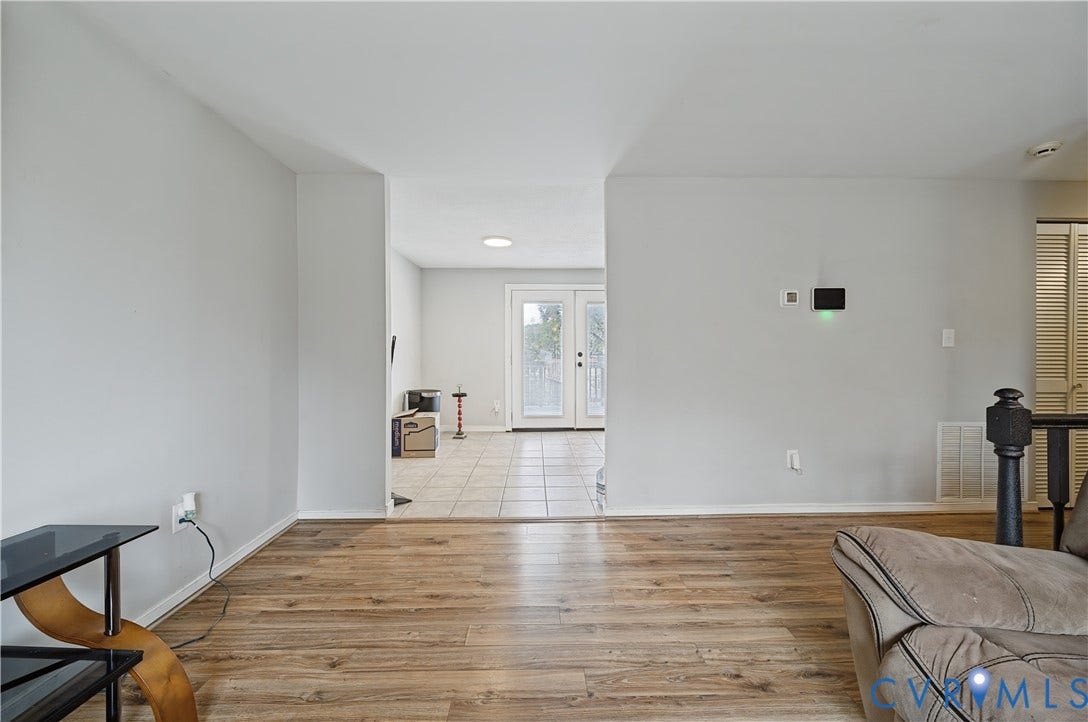 Wood-finish flooring and light-toned walls