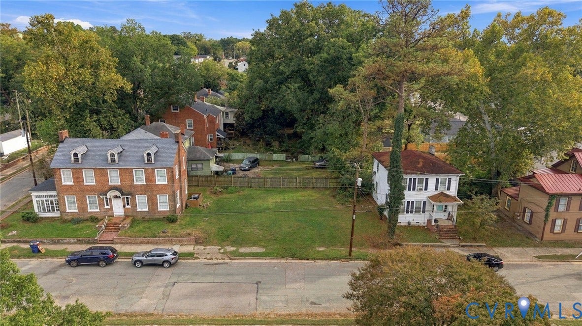 Expansive cleared lot with mature perimeter trees