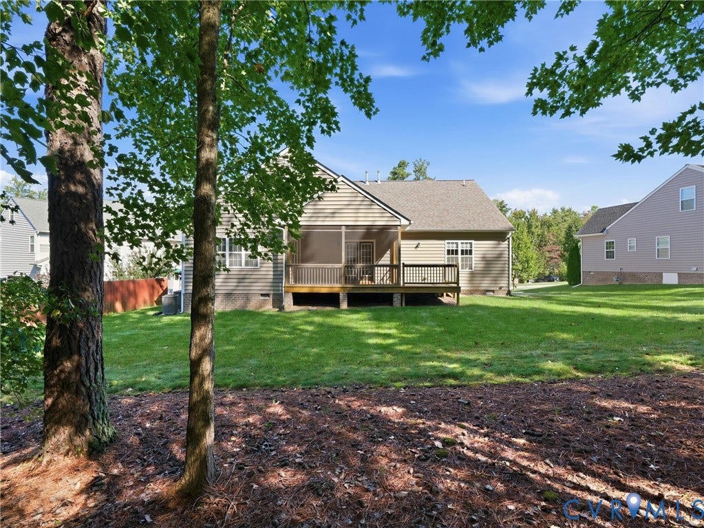 11037 Vogel Court, Bellshire, North Chesterfield, VA 23236 Rear exterior featuring horizontal siding, a covered screened-in porch with wood-style decking, and an expansive lawn