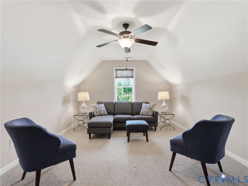 11037 Vogel Court, Bellshire, North Chesterfield, VA 23236 Vaulted ceilings with architectural rooflines, neutral wall paint, carpeting, and a central ceiling fan with integrated lighting
