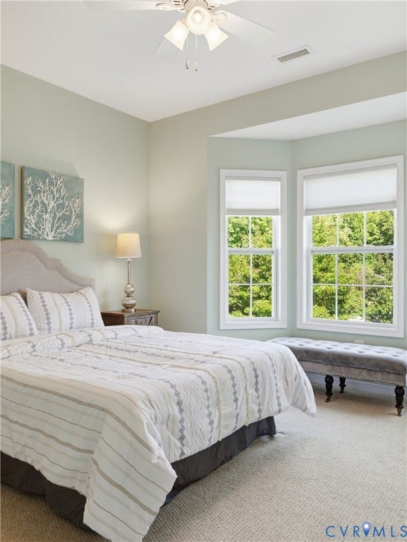 11037 Vogel Court, Bellshire, North Chesterfield, VA 23236 Bedroom featuring a bay window, neutral carpeting, ceiling fan with integrated lighting, and light-toned wall paint