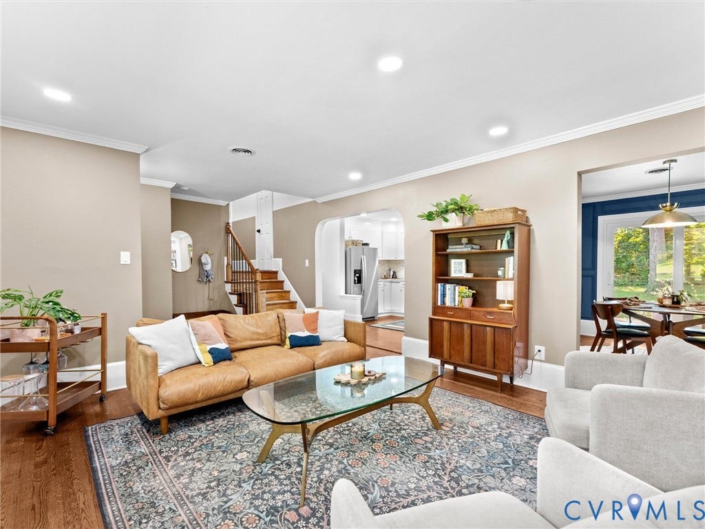 8341 Charlise Road, Stratford Hills, Midlothian, VA 23235 Living area featuring hardwood flooring, recessed lighting, crown molding, and an arched entryway